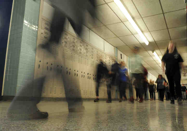 Ravenna High School and Brown Middle School participated in National WalkOut Day with assemblies. Middle school students walk to the gym for the assembly.    (Lisa Scalfaro / Record-Courier)